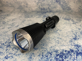 tactical flashlight with steel bezel