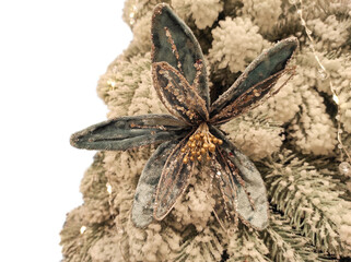 Floral decoration hanging on Christmas tree