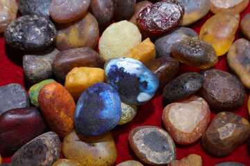 Beeswax stones are stacked together in a handicraft workshop, China