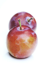 Plums on white bacground - close-up