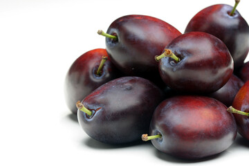 Plums on white bacground - close-up