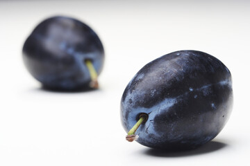 Plums on white bacground - close-up