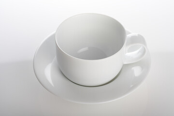 Empty cup on white background