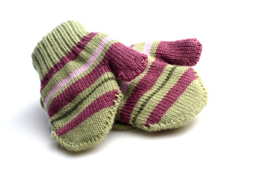 Baby gloves on white background