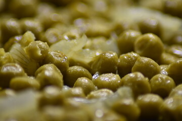 close-up of gravy with peas in a pan