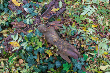 Historic Statue on the autumn mystery old Prague Cemetery, Czech Republic