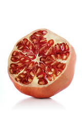 Pomegranate on white bacground - close-up