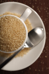 Brown sugar and cup - close-up