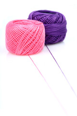 Ball of string on white background