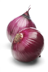 Red onions over white background