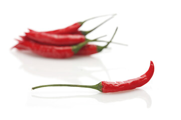 Red chili peppers on white background