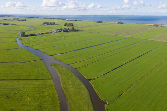 Aerial perspective of the polder landscape near Edam shows symmetrical drainage canals through flat farmland