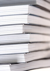 Note books in stack - close-up