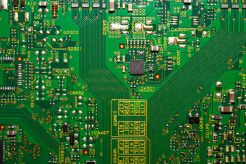 Electronic green printed circuit Board.Chip background.Texture of a computer chip with many...