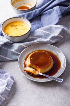 Custard Creme Caramel Flan dessert oven cooked. Homemade milk and egg dessert with caramelized sugar sauce