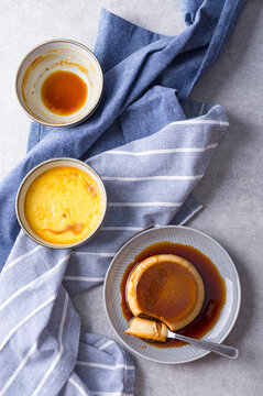 Custard Creme Caramel Flan dessert oven cooked. Homemade milk and egg dessert with caramelized sugar sauce