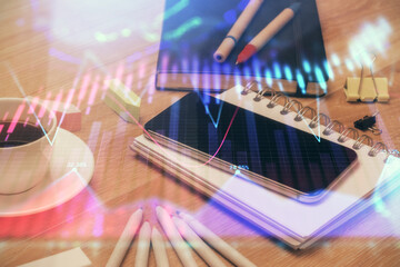 Double exposure of forex chart drawing and cell phone background. Concept of financial trading