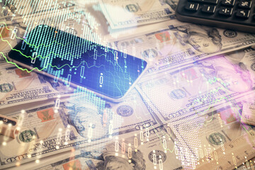 Double exposure of forex graph drawing over us dollars bill background. Concept of financial markets.