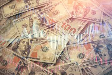 Multi exposure of forex chart drawing over us dollars bill background. Concept of financial success markets.