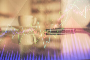 Double exposure of forex chart over coffee cup background in office. Concept of financial analysis and success.
