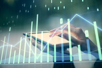 Double exposure of forex chart sketch hologram and woman holding and using a mobile device. Financial market concept.