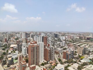 Panoramic view form a high floor building with neutral sky