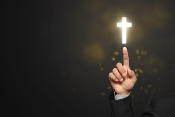 Businessman hand showing Christian cross