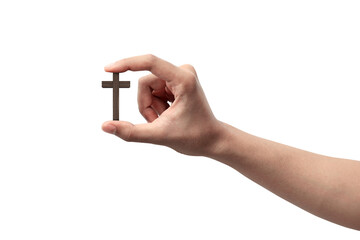 Human hand holding Christian cross