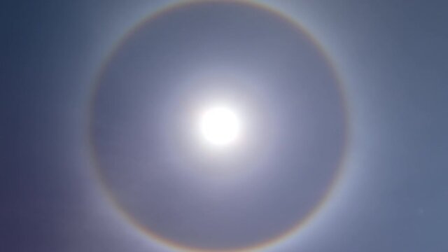 Perfectly full framed sun dog in blue sky