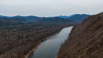 Fototapeta premium Valley Of The Mountain River Anyuy. Khabarovsk territory in the far East of Russia. The view of Anyui river is beautiful. Anyu national Park. Landscape mountain river in the Russian taiga.
