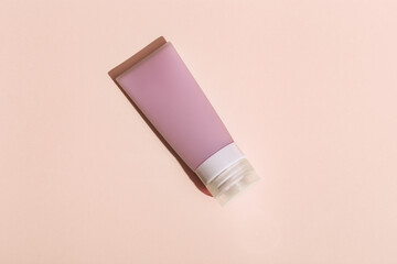 Cosmetic tube for cream, gel, lotion. Beauty product package, mock up plastic container with hard shadows