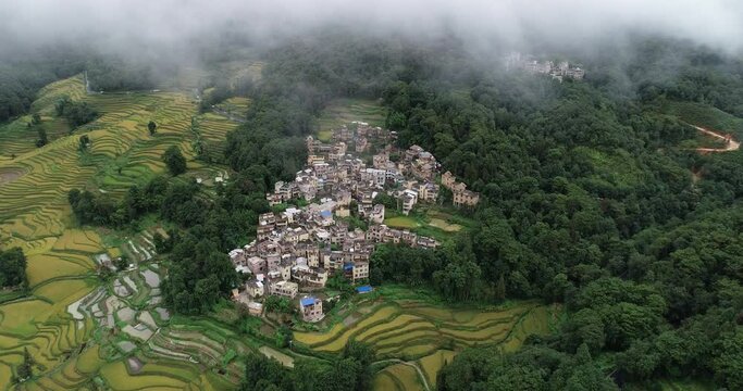 Aerial view of farmland and the village house of Yuanyang Terrace Scenic Area