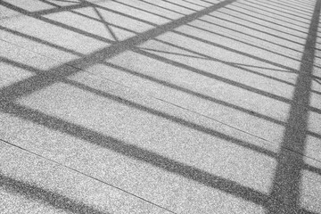 Abstract stripe shadow lines on ground. 