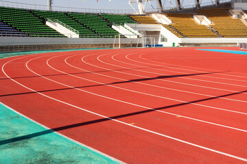 Obraz premium Running track for the athletes background in stadium.