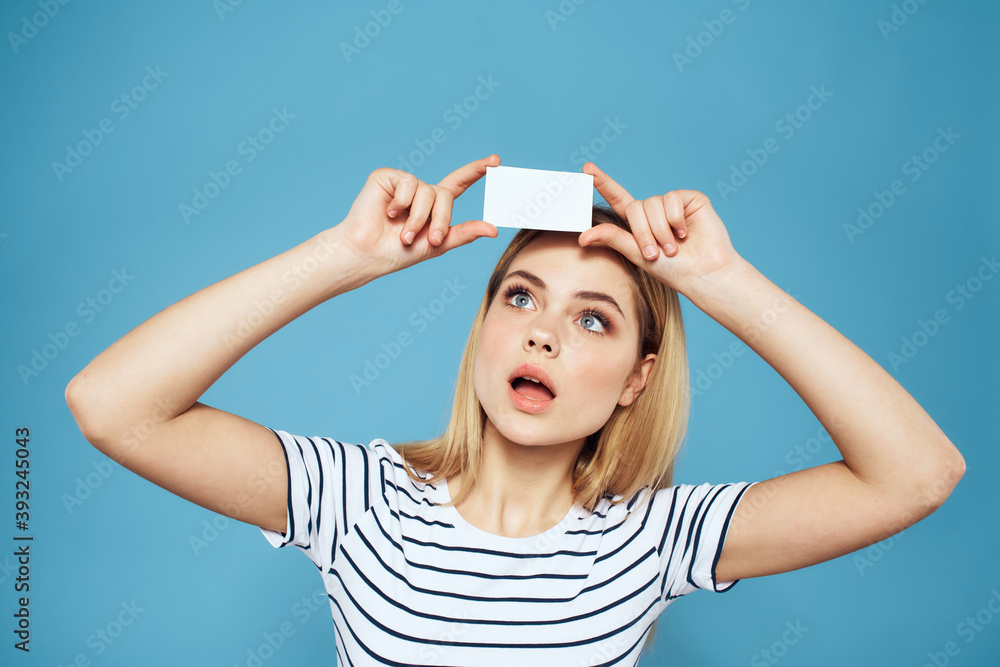 Poster Woman holding business card emotions cropped blue background