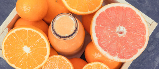 Freshly blended coctail or smoothie made of citrus. Healthy dessert for diet and slimming