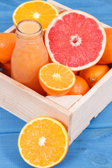 Fresh coctail or smoothie made of citrus fruits. Healthy dessert for diet and slimming