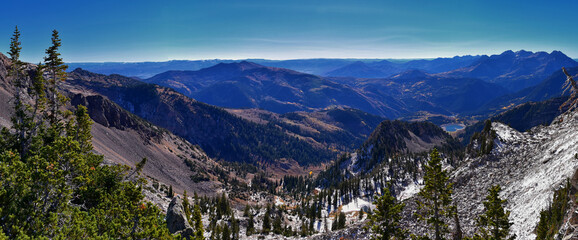 View of mountain landscape from White Baldy and Pfeifferhorn trail, Box Elder and Mill Canyon Peak, American Fork Canyon and Silver Lake in fall, Wasatch Rocky mountain range, Utah, United States. 