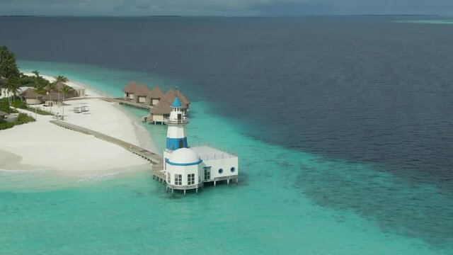 Lookout tower pearched at the end of beautiful tropical island overlooking ocean
