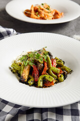 Gemelli pasta with baked vegetable