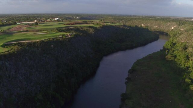 Aerial forward over Dye Fore golf course and Chavon river