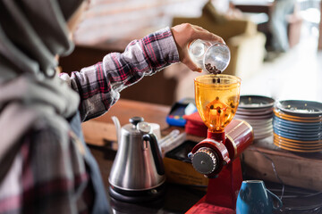 make a coffee with coffee machine in cafe