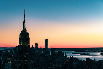 Empire State building at New York City during sunset.
