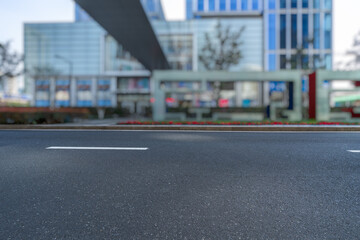 empty asphalt road with city skyline background in china.