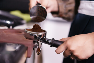 barista showing process make a coffee in cafe