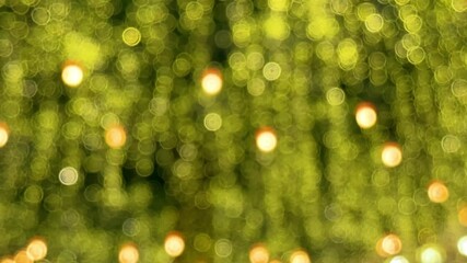 A blurred christmas tree with sparkling decorations on it - Powered by Adobe