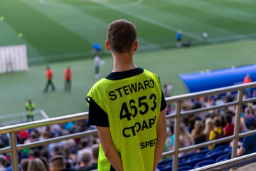 Steward at a football match, stadium