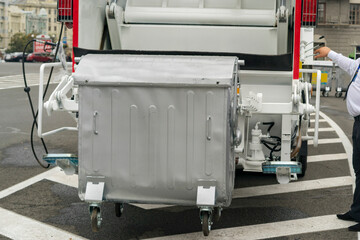 Garbage collection in the city by a garbage truck