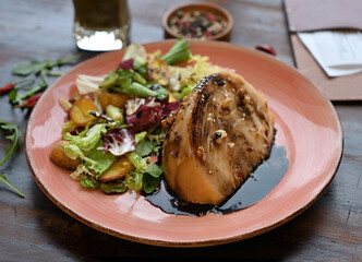 Cabbage steak with mixed salad