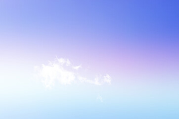Beautiful blue and pinkish sky with faint and scattered clouds